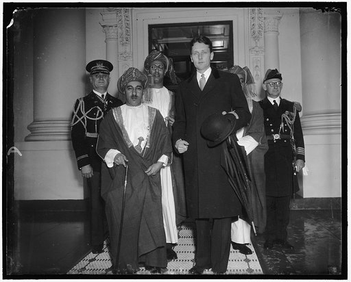 The Sultan of Muscat & Oman Wayyid Said Bin Taimur Bin Faisal, at White House. With Stanley Woodward, asst. chief of the Div. of Protocol, State Dept.