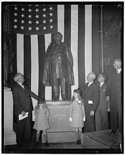 Statue to great commoner unveiled at Capitol. Washington, D.C., April 27. A statue of William Jennings Bryan was unveiled in Statuary Hall at the Capitol today by the Nebraska Memorial Commission. In the photograph, left to right: Senator George W. Norris of Nebraska, Katherine Lehman and Helen Lehm