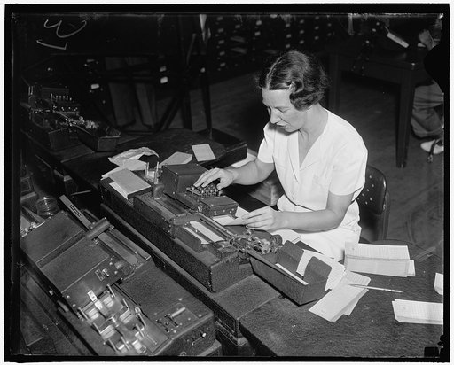 Baltimore, Md. The 'work' cards, by means of which constant check is kept on what is being done with each block of social security account applications, are punched in the Production and Control Section. Each hole in each 'work' or operation card represents a letter or a numeral. When translated, th
