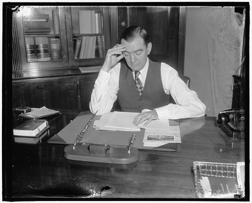 Congressman's day. 11:00 A.M. Rep. Thomas studies the bills now before Congress or works on bills he is proposing to introduce