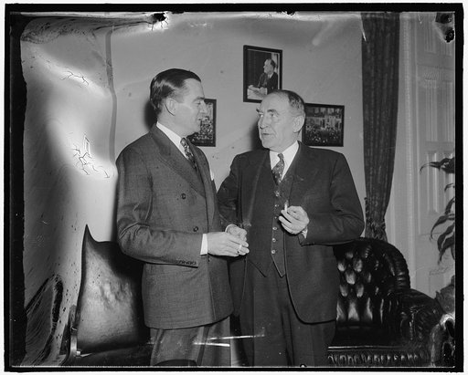 Congressman's day. 11:40 A.M. Rep. Thomas engages in a short conference with Speaker Bankhead before attending to his duties on the floor of the House