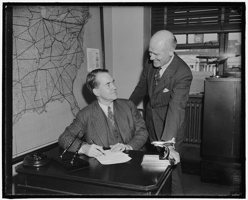 New member of Civil Aeronautics Authority assumes post. Washington, D.C., May 6. Edward P. Warner, recently appointed a member of the Civil Aeronautics Authority, today took the oath of office and assumed the new post. He is pictured with Robert H. Hinckley, right, chairman of the authority. Warner 