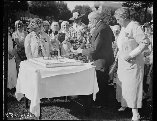 Eleanor Roosevelt and group; cake cutting