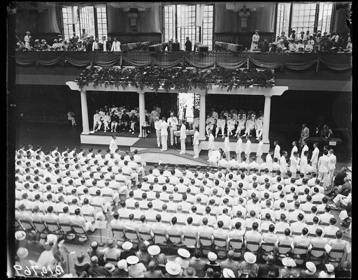 Presenting diplomas at Annapolis
