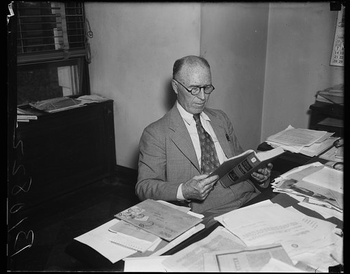 William Lemke at desk