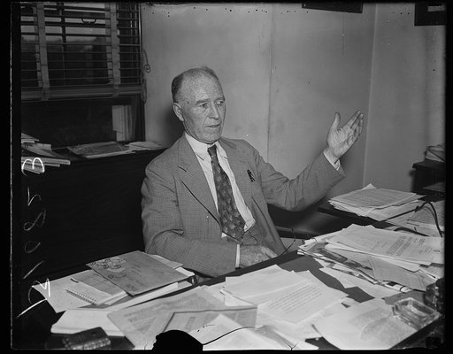 William Lemke at desk