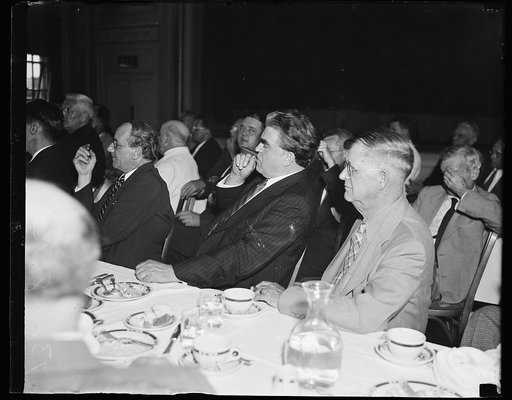 John L. Lewis listens to Smith, Washington, D.C., August 7. John L. Lewis listening to the Rev. Smith blast the New Deal at the Premiere Club in Washington today. Smith also professed that we would all see the day and thank Lewis for breaking away from the American Federation of Labor