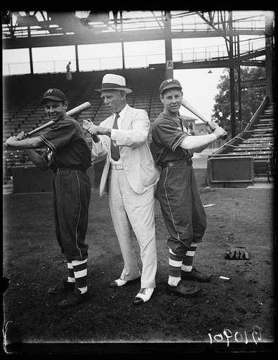 "Old Fox" teaches twin nephews fine points national pastime, Washington, D.C., August 11. Additions to Clark Griffith's "bargain counter" Washington ball club in 1942 will no doubt be these twin nephews of the "Old Fox", Jimmy and and Billy Robertson. The youngsters are now starring for amateur team