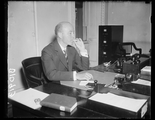 U.S. Envoy to Moscow reported relinquished post. Washington, D.C., Aug. 12. Reports in Washington have William C. Bullitt, American Envoy to Moscow, resigning his diplomatic post in the near future. This picture of Ambassador Bullitt was made at the State Department today where he has been making a 