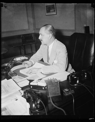 Department of Justice keeps Suydam. Washington, D.C., Aug. 13. Dropped from the Federal pay roll on July 1 because he did not hold a law degree, Henry Suydam, former newspapermen acting as press liaison officer for Attorney General Cummings, is now on the job again but with a new title. He now rates