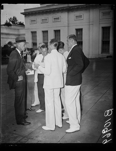 Tenders resignation to president. Washington, D.C., Aug. 11. Lyle T. Alverson, Chairman of the National Emergency Council, leaving the White House today after submitting his resignation to President Roosevelt. After the President accepted the position for a limited time and he was anxious to return 