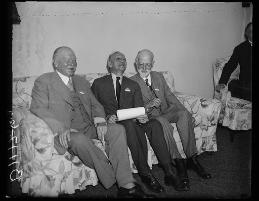 World I over officials, Washington, D.C. Sept. 7. The leaders of the Third World Power Conference held a meeting in the morning to discuss some of the details of the meeting. Photo shows, left to right: Julius Dorppuller of Germany, President of the Conference, Director O.C. Morill acting as host, a
