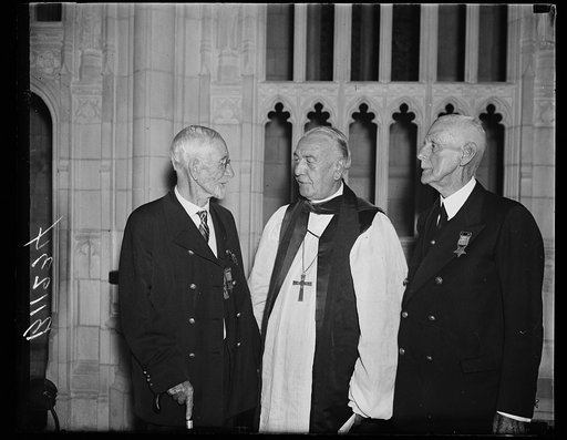 Oley Nelson, right; with clergy
