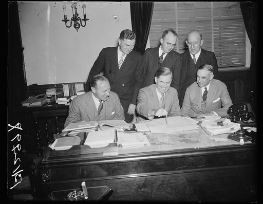 Crop Insurance Committee meets for first time. Washington, D.C. Sept. 25. Secretary of Agriculture Henry A. Wallace, as chairman called the crop insurance committee appointed by President Roosevelt this week into session today for the first time. The first thing the committee will consider, Wallace 