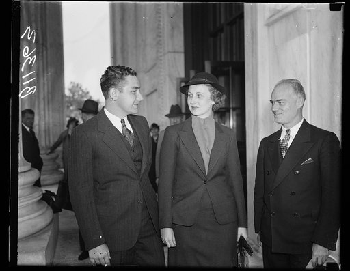 Admitted to Supreme Court practice at 22, Washington, D.C. Oct. 5. Proving that beauty can be combined with brains, Mrs. Henry Moore of Memphis, Tenn., was admitted to practice before the United States Supreme Court today, the youngest woman to ever receive this honor. Mrs. Moore is shown with Emery