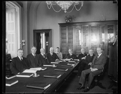 Group; George Norris at head of table