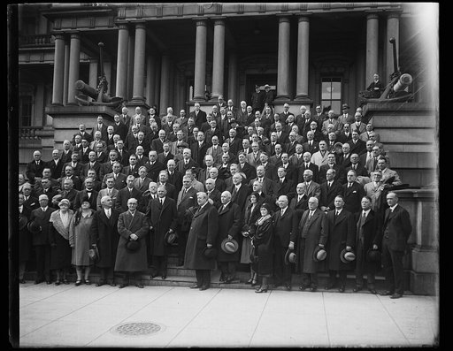 Herbert Hoover and group on steps of State, War and Navy Building, Washington, D.C.