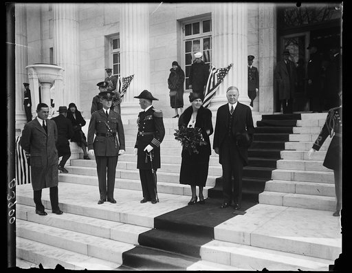 President and Mrs. Hoover attend dedication of New Red Cross Building to Women of World War. President and Mrs. Hoover leaving the newest Red Cross building in Washington which was dedicated today to the women of the World War. General John J. Pershing presented the building, on behalf of the contri