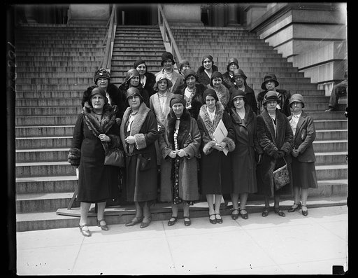 National Association Women Lawyers see President Hoover through four representatives, asking for United States Plenipotentiaries to the Hague to vote for a World Code of equality between men and women. Left to right, front row: Mrs. Olive Stott Gabriel, President, Mrs. James Garfield Riley, Dean Was