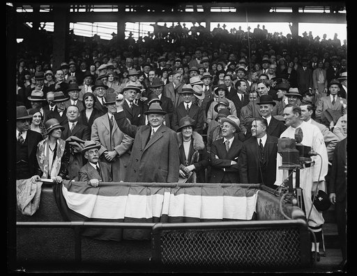 Herbert Hoover with baseball in stands
