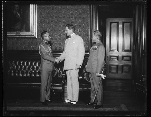 Patrick J. Hurley, center