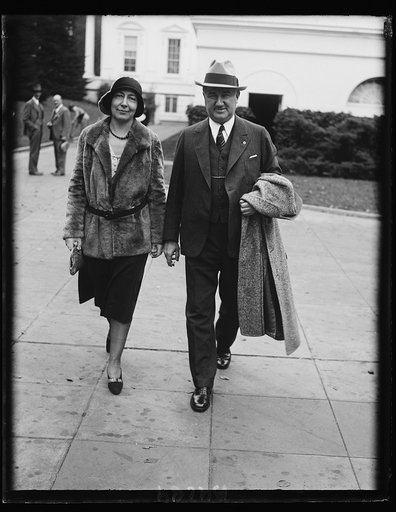 Legion heads visit White House. Mrs. Robert Lincoln Hoyel of Douglas, Ariz., National President of the American Legion Auxiliary, and Ralph T. O'Neil of Independence, Kas., new National Commander of the American Legion, were snapped by the cameraman as they left the White House, where they called on
