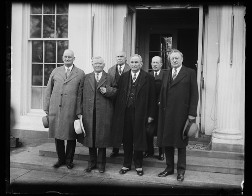 Just an old congressional custom. One of the old customs in connection with the opening of Congress is to send a joint committee to the president to inform him that Congress has convened. The photograph shows the delegation at the White House following the convening of the present session. Front row