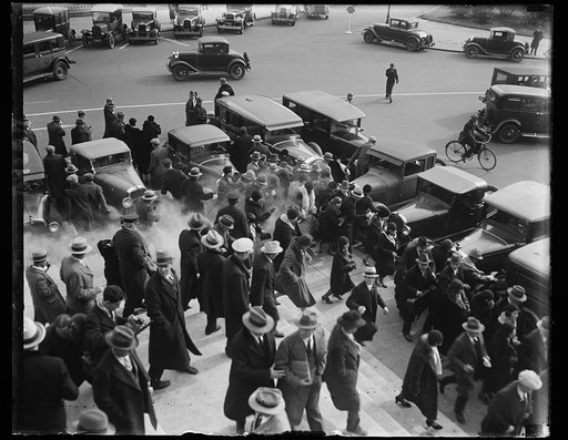 Police route Communists with tear gas at demonstration during congress opening. In this photograph, taken from the steps of the Capitol, shows Communists milling about in a cloud of tear gas, which police used to break up a demonstration during the opening of the 71st Congress. Some 300 communiststo