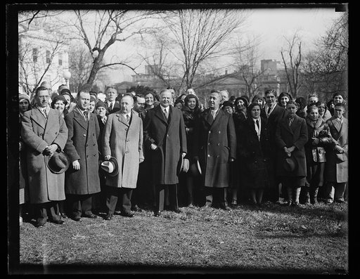 Chicago teachers visit president. Rep. Carl R. Chindblom of Illinois, President Hoover and Cliff Hastings of Oak Park, Ill., photographed at the White House when 300 Chicago school teachers called to pay their respects