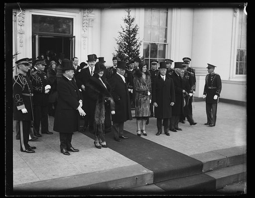 Distinguished guests at reception. Here are a few of the distinguished guests at the White House reception on New Year's day. In the front of the group are Edward Everett Gann and Mrs. Gann, sister of the vice-president; Vice-president Curtis, Miss Fanny Homans of New York, niece of Secretary of the