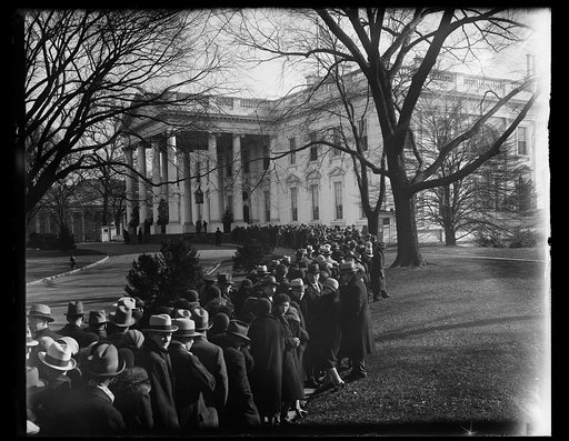 Waiting to see the president. This photograph shows part of the crowd which lined up to shake hands with President and Mrs. Hoover at the annual White House reception on New Year's day. 1/1/31