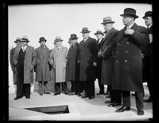Engineer Hoover inspects bridge. Casting aside the role of president for a short time, Herbert Hoover was again an engineer when he inspected, as chairman of the Arlington Memorial Bridge Commission, the new structure being built