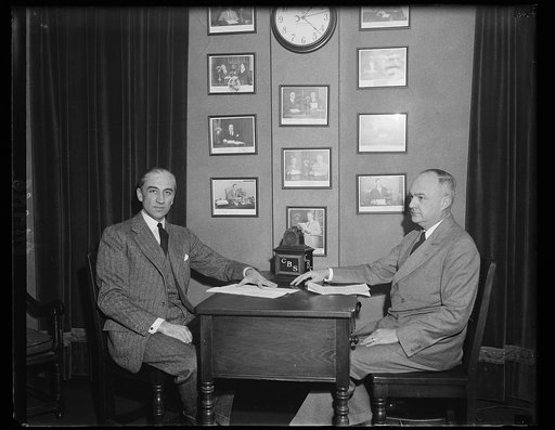 Minister from Romania, Hon. Charles A. Davila at mike with Wallace S. [Mu...] of State Dept., Murria of State Dept.