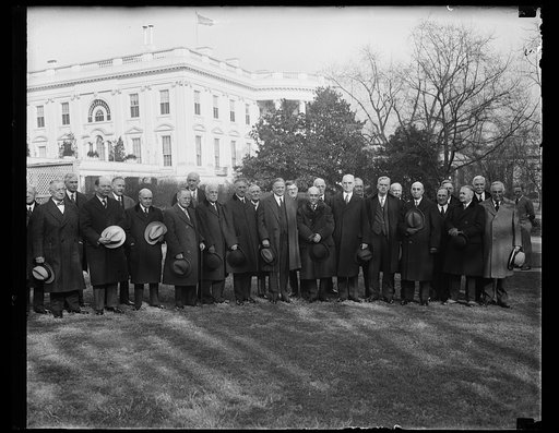 Herbert Hoover and group, including Henry L. Stimson, to left of Hoover, at White House, Washington, D.C.