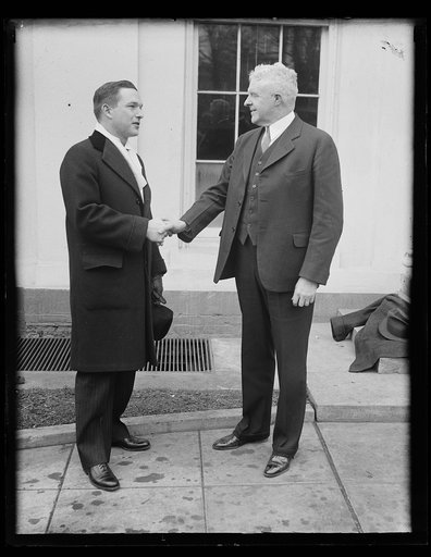 Men shaking hands at White House, Washington, D.C.