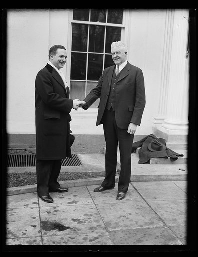 Men shaking hands at White House, Washington, D.C.