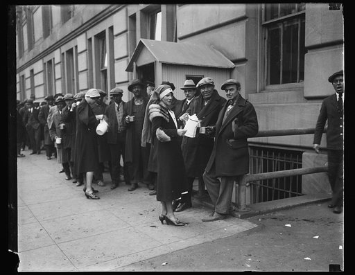 American Red cross serving beverages to men standing in line