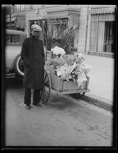 African American man with flower cart
