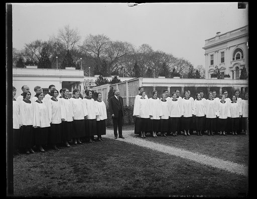 Herbert Hoover and choir group outside White House, Washington, D.C.