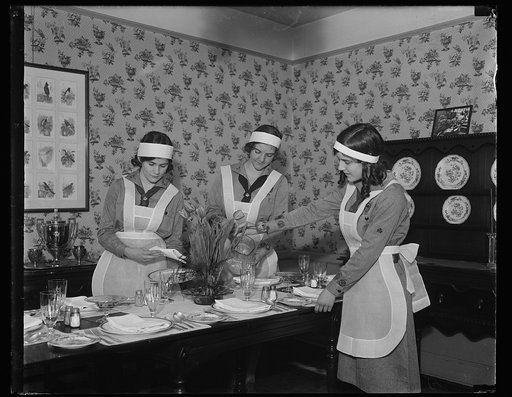 Girl Scouts setting table