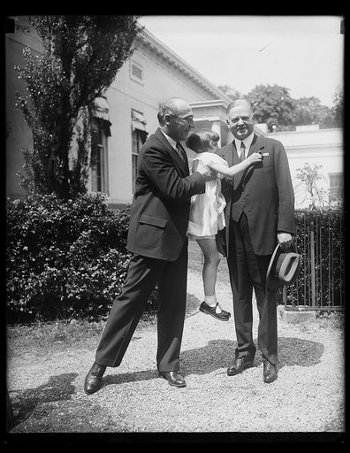 Herbert Hoover, right; with unidentified man and child outside White House, Washington, D.C.