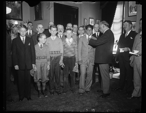 Charles Curtis and group of men and boys