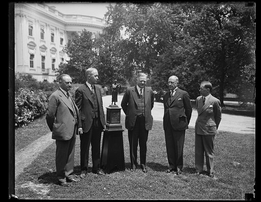 President [Hoover] congratulates winnters of safety contest. Representatives of four winning companies in the National Safety Competition in Mining and Quarrying, conducted by the United States Bureau of Mines, were awarded the "Sentinels of Safety" and congratulated by President Hoover at the White