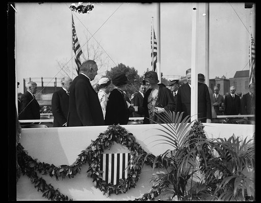 Lou Hoover and Herbert Hoover at stand with group