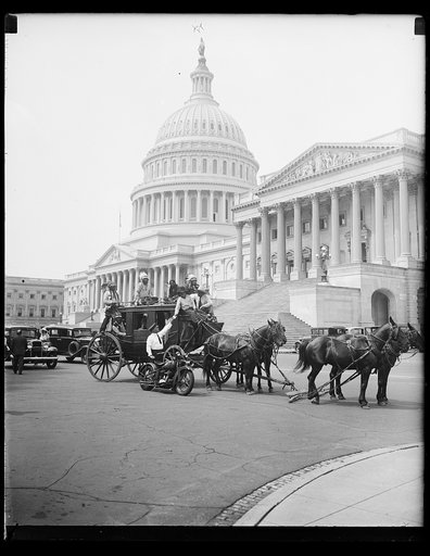 Horse drawn carriage in front of U.S. Capitol, Washington, D.C.