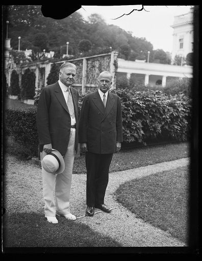 Herbert Hoover, left, outside White House, Washington, D.C.
