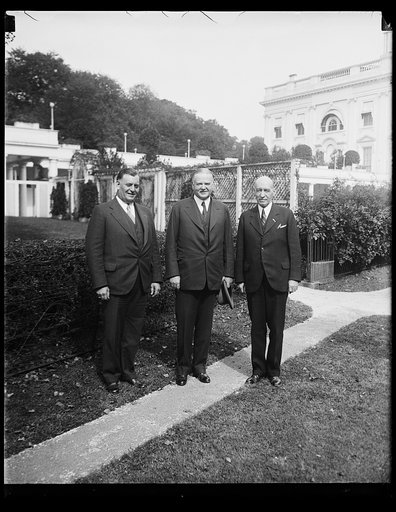 Herbert Hoover, center, outside White House, Washington, D.C.
