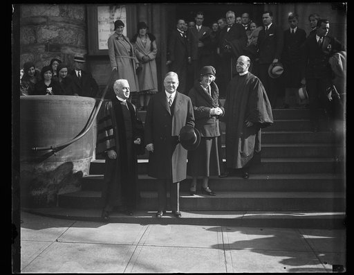 Herbert Hoover and Lou Hoover with clergy on steps of church