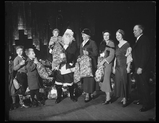 Lou Hoover and Santa with children