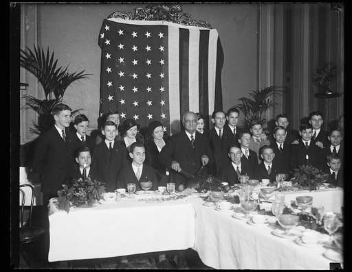 Vice-president entertains pages. One of the yuletide events the pages of the Senate look forward to with anticipation is the annual dinner given for them by Vice-President Charles Curtis. The photograph shows the pages at this year's party, with their genial host about to carve the turkey